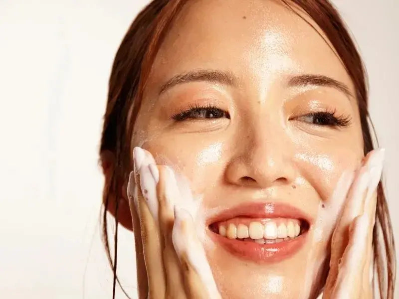Cover image of a girl washing her face