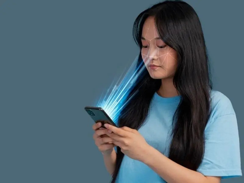 Cover image showcasing woman holding a phone and blue light falling on her skin