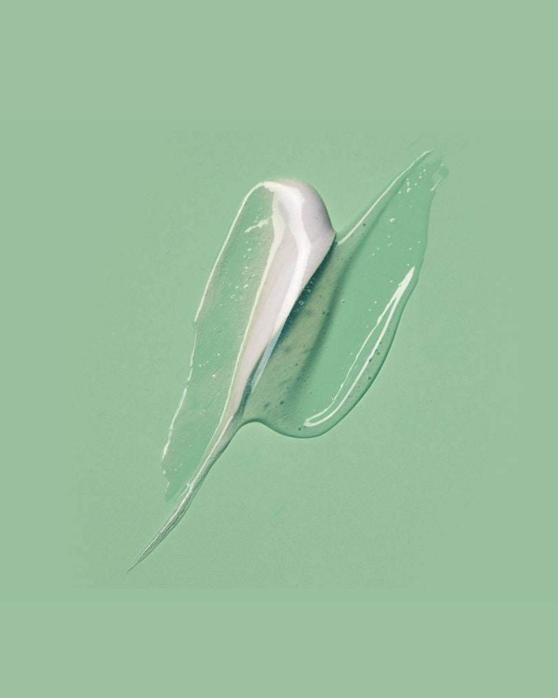 Cleanser smear on a green background