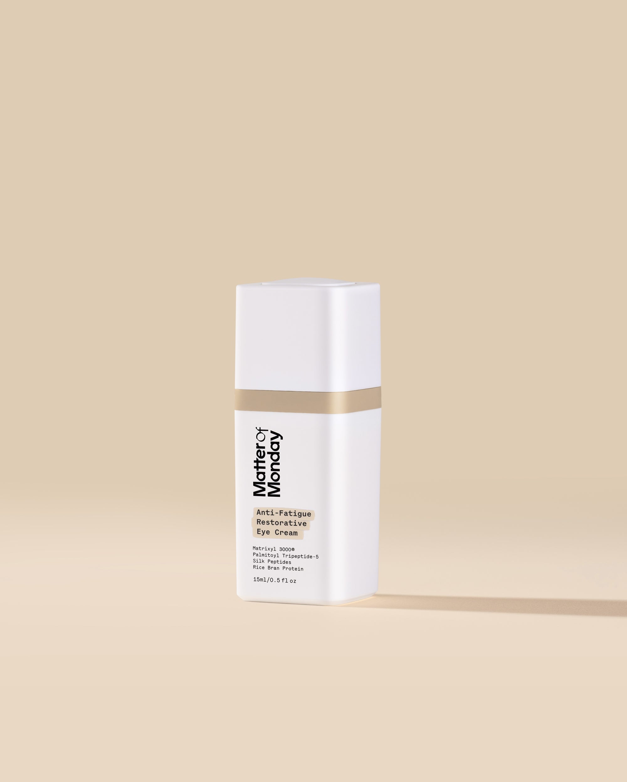Skincare bottle labeled 'Mother of Monday' on a beige background